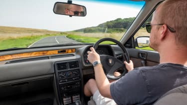 Auto Express chief reviewer Alex Ingram driving the Rover 214i